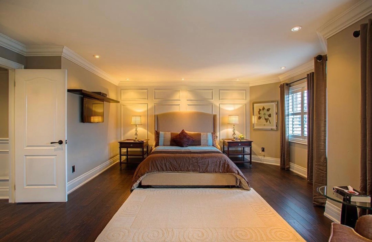 Wainscoting installed on a bedroom feature wall.